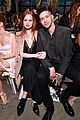 madelaine petsch travis mills sit front row at nyfw 01