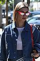 hailey baldwin dons semi sheer top and denim mini skirt for lunch in weho 02