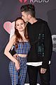 madelaine petsch gets a kiss from travis mills at iheart radio music awards 03