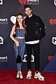 madelaine petsch gets a kiss from travis mills at iheart radio music awards 10