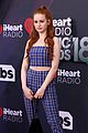 madelaine petsch gets a kiss from travis mills at iheart radio music awards 11