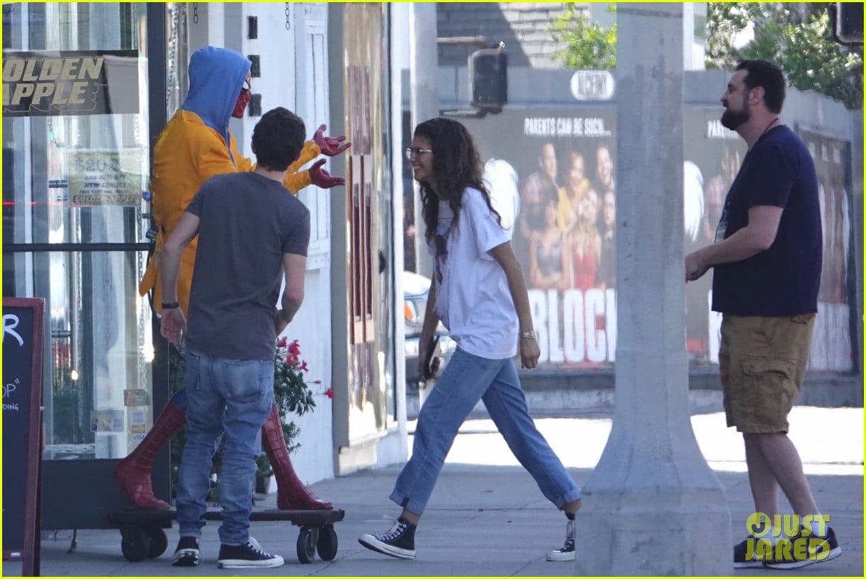 Zendaya & Tom Holland Run Into Spider-Man at Comic Book Store! | Photo