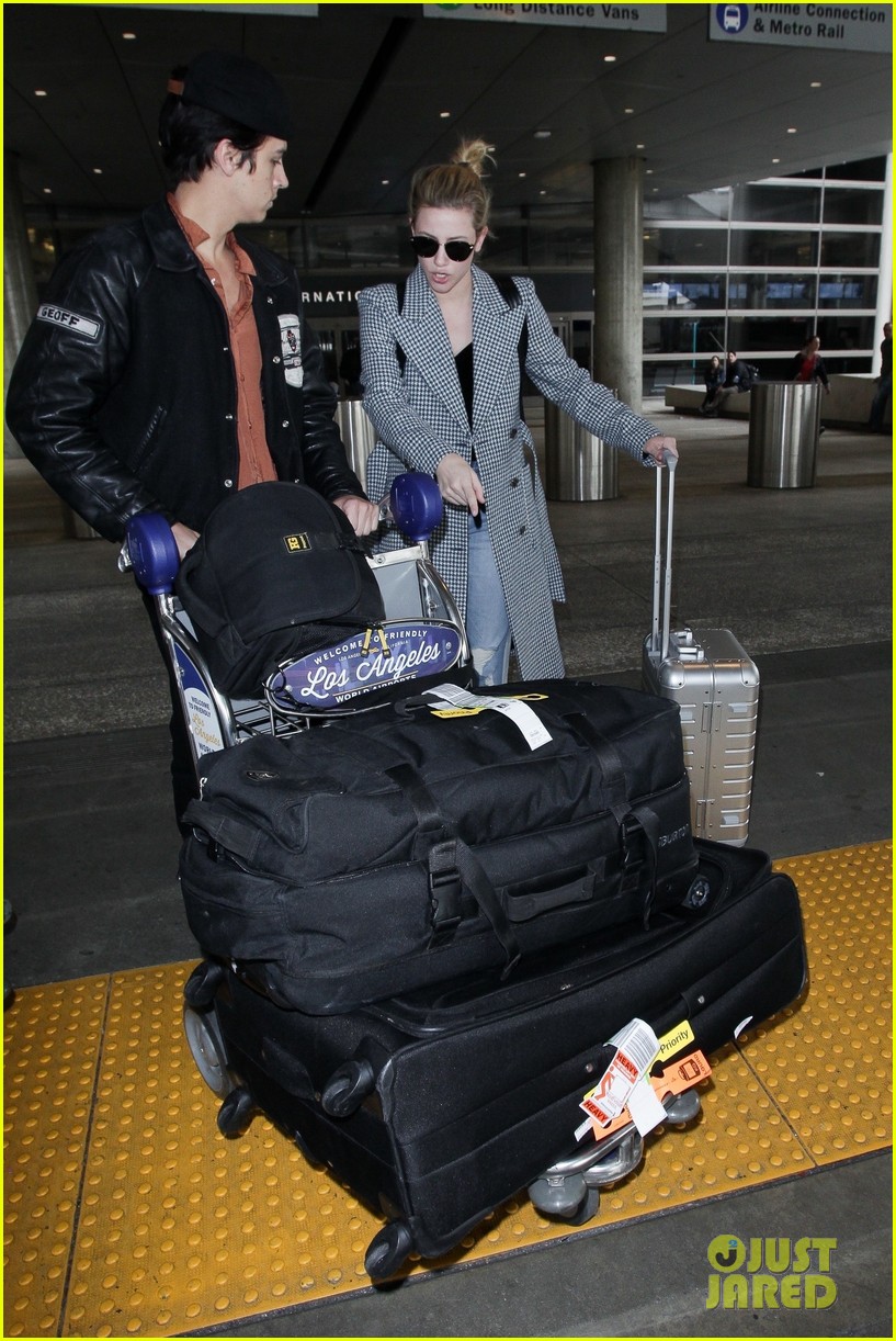 Cole Sprouse & Lili Reinhart Return To LA After Parisian Trip Together