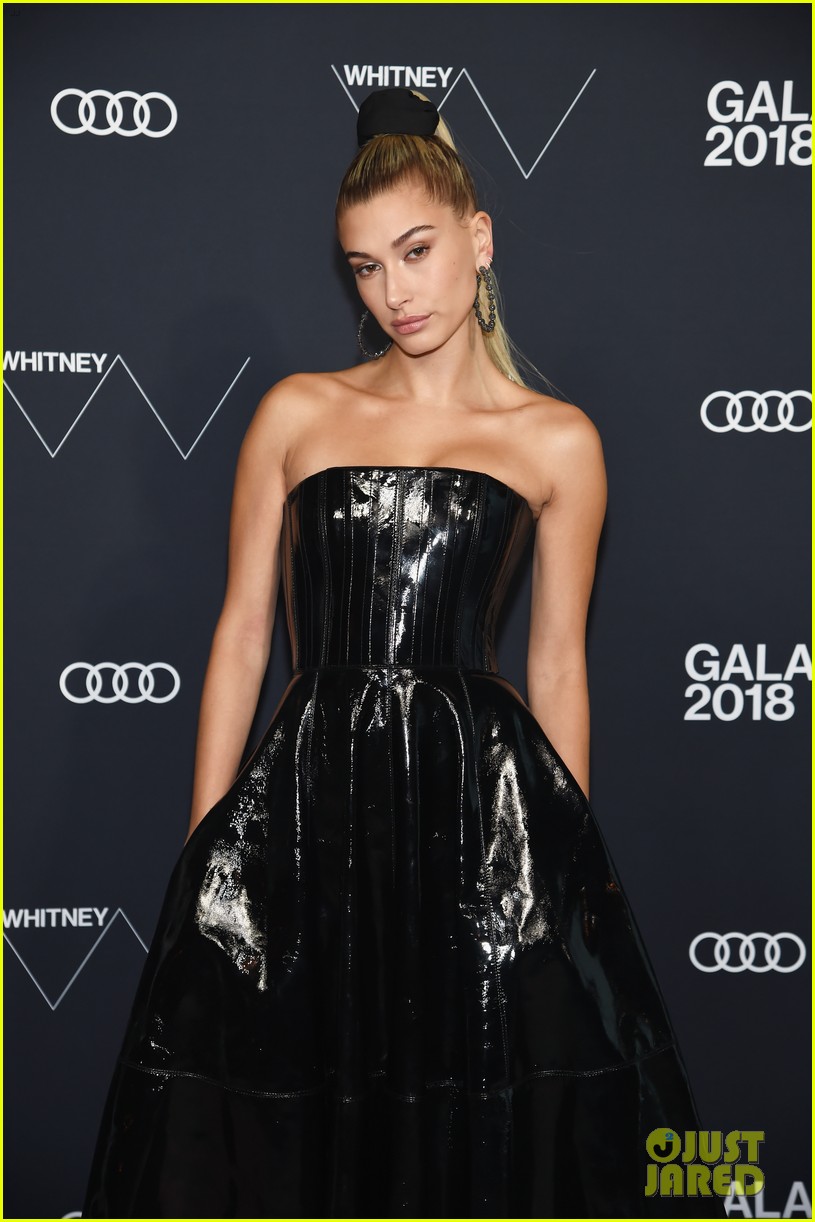 hailey baldwin looks sleek in black leather dress at whitney gala 2018 02