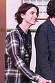 timothee chalamet is all smiles while out with a friend in london 03