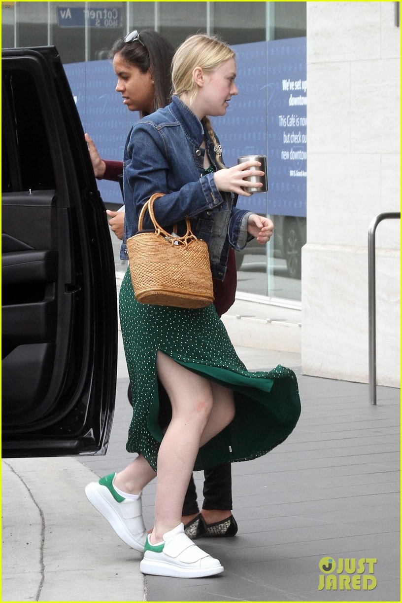 Dakota Fanning Dons Denim Jacket With Green Polka-Dot Dress for Work