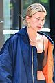 hailey baldwin pairs crop top with gym shorts while out in nyc 04