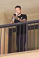 liam payne performs one directions little things from hotel balcony 05