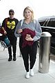 meghan trainor shows off her engagement ring from daryl sabara at lax 09. 