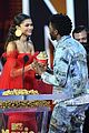 zendaya presents chadwick boseman with best performance in a movie at mtv movie tv awards 01