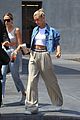 hailey baldwin sports crop top and oversized khakis while out in beverly hills 01