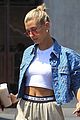 hailey baldwin sports crop top and oversized khakis while out in beverly hills 07