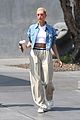 hailey baldwin sports crop top and oversized khakis while out in beverly hills 08