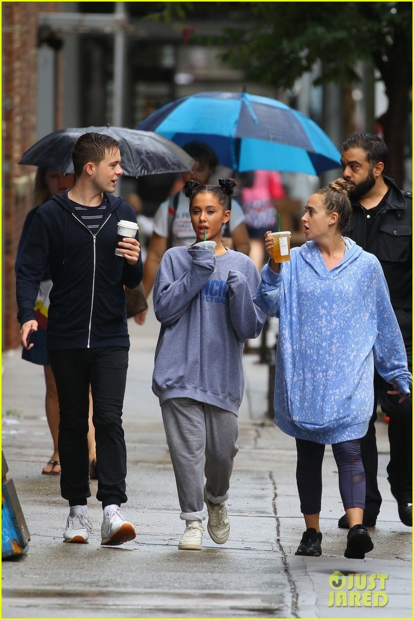 Full Sized Photo of ariana grande friends get drenched rain storm 18