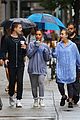 ariana grande friends get drenched rain storm 16