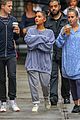 ariana grande friends get drenched rain storm 26