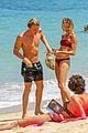 cody simpson hits the beach with girlfriend clair wuestenberg 01