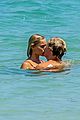 cody simpson hits the beach with girlfriend clair wuestenberg 03
