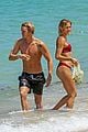 cody simpson hits the beach with girlfriend clair wuestenberg 07