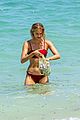 cody simpson hits the beach with girlfriend clair wuestenberg 22