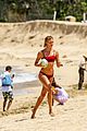 cody simpson hits the beach with girlfriend clair wuestenberg 30
