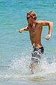 cody simpson hits the beach with girlfriend clair wuestenberg 33