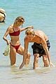 cody simpson hits the beach with girlfriend clair wuestenberg 51