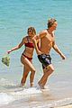 cody simpson hits the beach with girlfriend clair wuestenberg 53