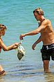 cody simpson hits the beach with girlfriend clair wuestenberg 58