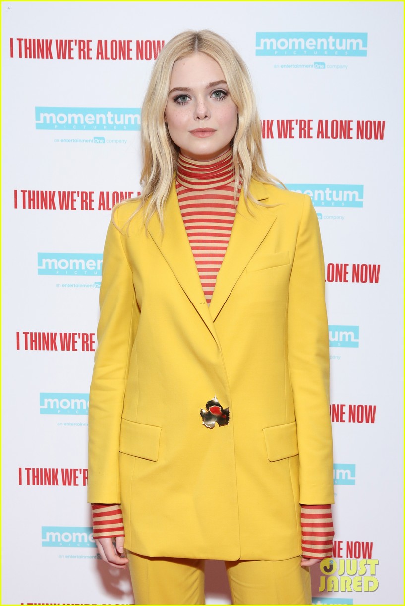 Elle Fanning Brightens Up A Rainy Day With Her Yellow Suit at 'I Think