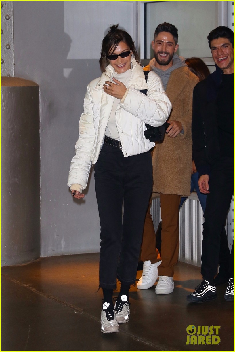 Full Sized Photo of bella hadid bundles up while heading to work 07