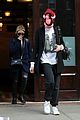 cara delevingne makes ashley benson laugh while stepping out with stuffed monkey on her face05