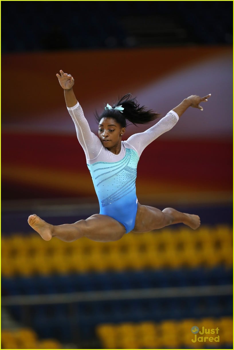 Full Sized Photo of simone biles wins all around title hurd 02