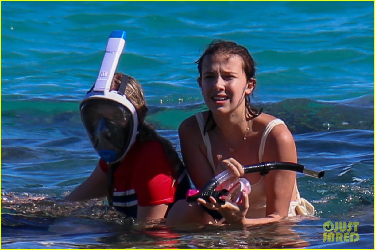 millie bobby brown and julian dennison hit the beach in oahu 03