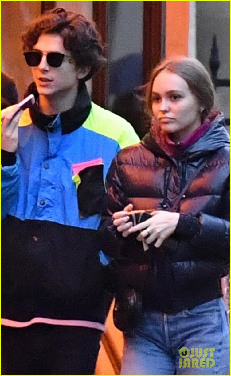 timothee chalamet lily rose depp stroll arm in arm in paris 01