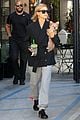 hailey bieber flashes her midriff while stepping out with puppy oscar 06