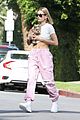 hailey bieber flashes her midriff while stepping out with puppy oscar 07