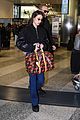 bella hadid jets from milan to nyc with cute cherry tote 01