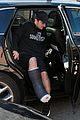 josh hutcherson makes a coffee run on his injured leg 02
