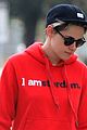 kristen stewart dons bright red sweatshirt for hike with her dog 04