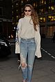 gigi hadid wears turtleneck with woman printed on large sleeves 05