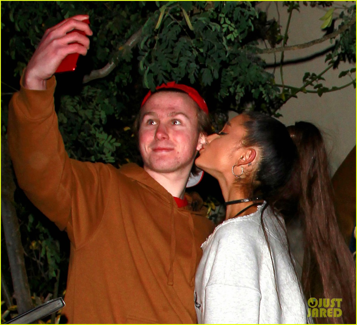 Full Sized Photo of ariana grande dons black and white platform heels