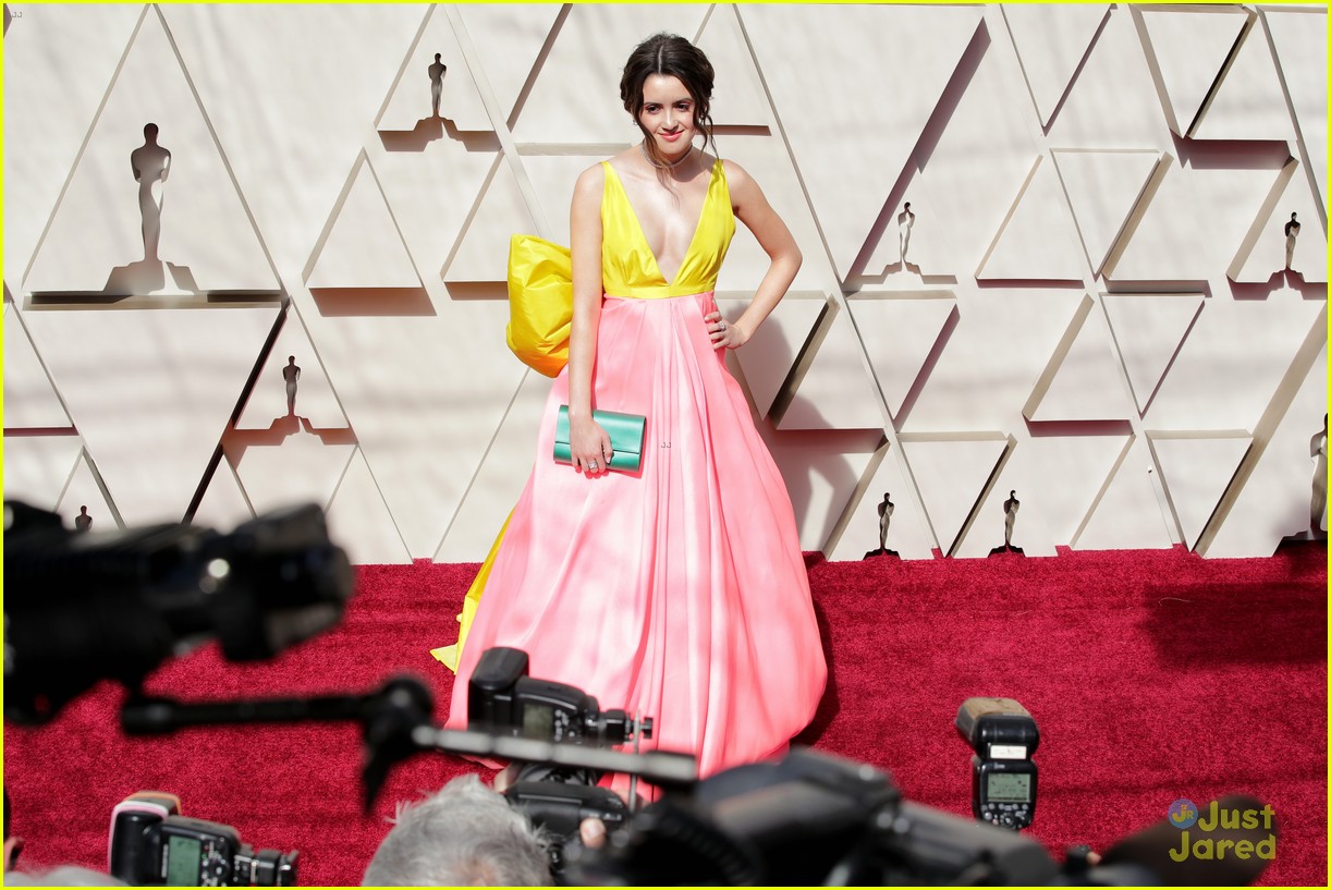 Laura Marano Wears Giant Yellow Bow on Her Dress For First Oscars