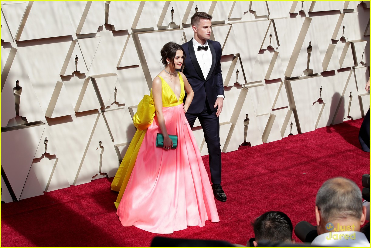 Laura Marano Wears Giant Yellow Bow on Her Dress For First Oscars