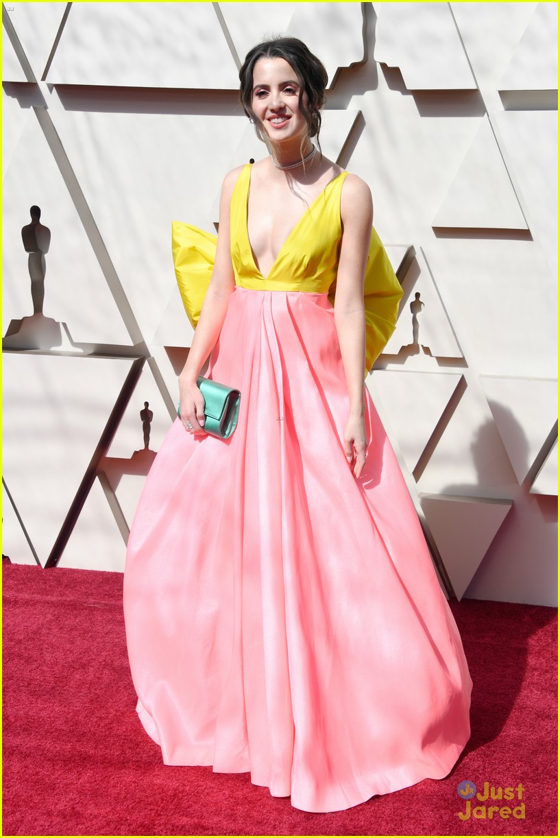 Laura Marano Wears Giant Yellow Bow on Her Dress For First Oscars