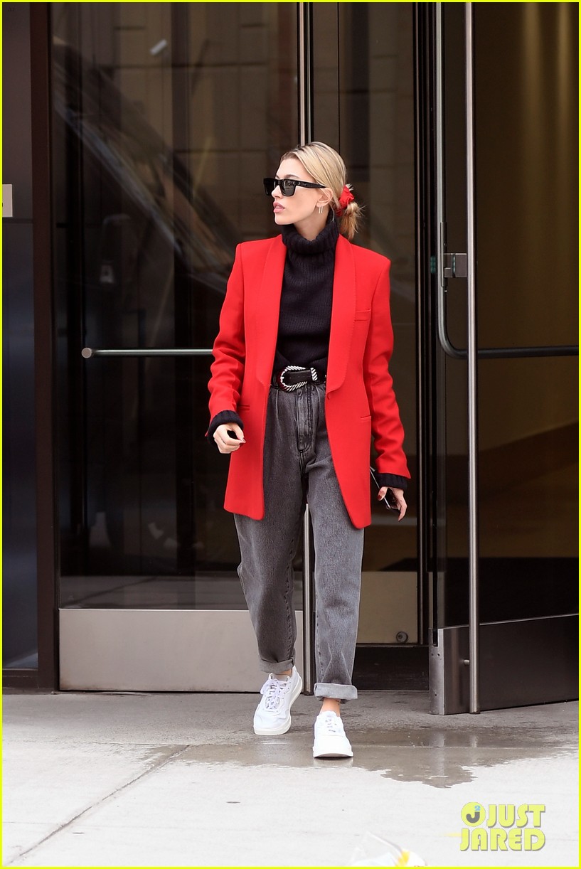 Hailey Baldwin Bieber looks trendy in a Louis Vuitton jacket while