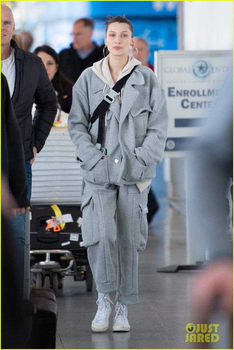 bella hadid bundles up in comfy grey suit while landing in nyc 03