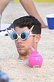 the jonas brothers throw huge beach party for music video in miami 05