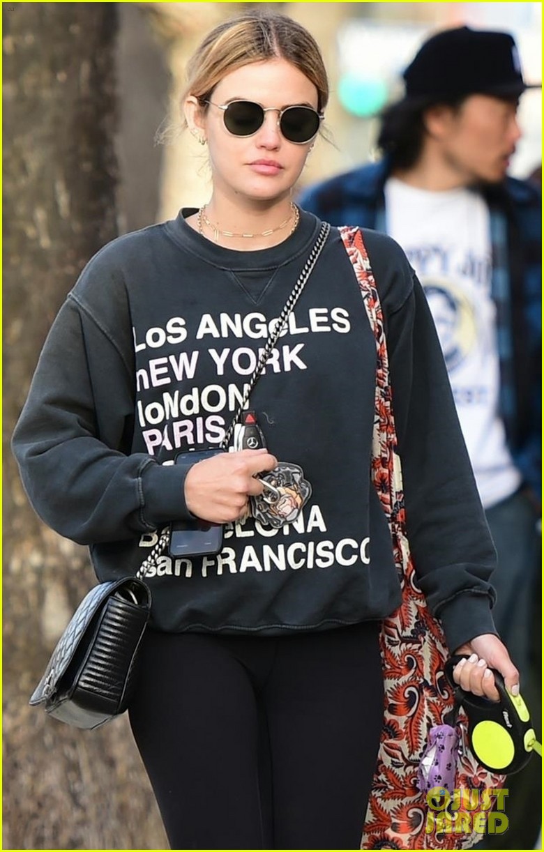 lucy hale takes her pup for a walk in la 06