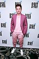 charlie puth charlotte lawrence walk carpet separately at bmi pop awards 09